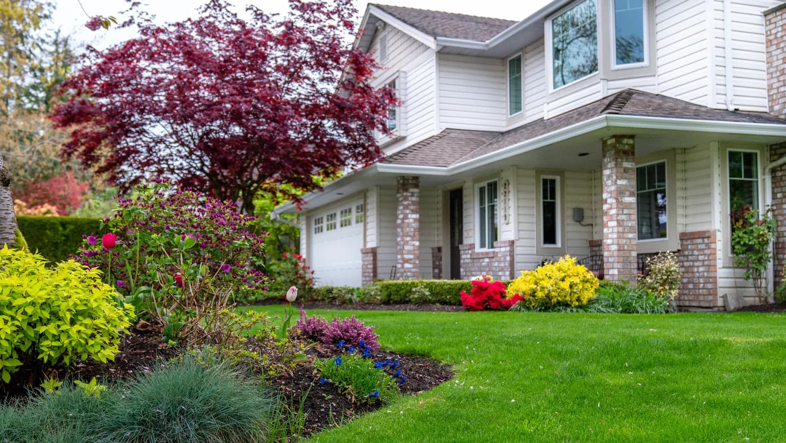 Exterior of an established two-storey home in the Lower Mainland