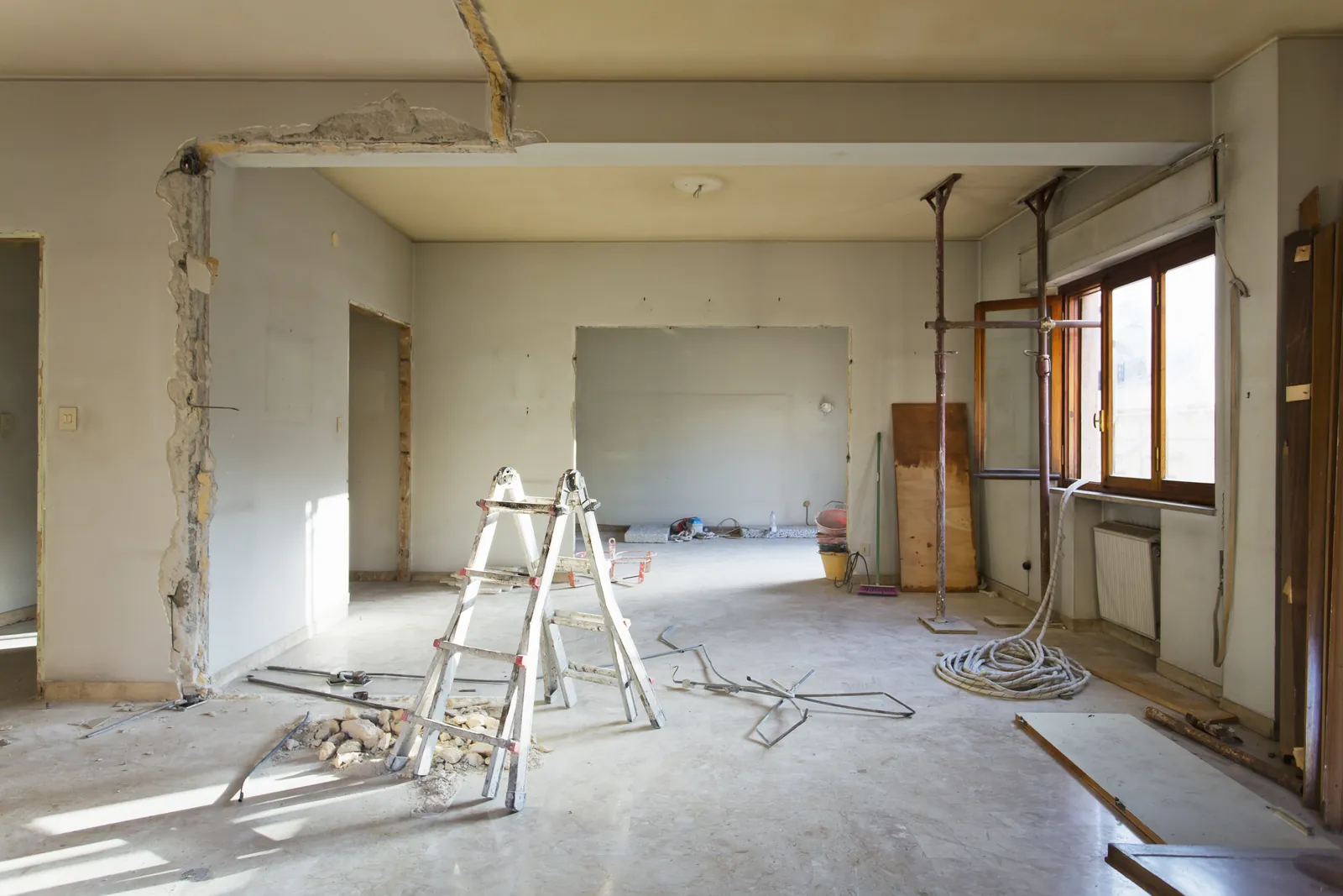 Interior of an older home being renovated and prepared for new insulation